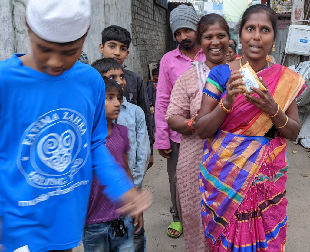 Hyderabad, India - Participating in Mobile Food Rescue Program by Distributing Hot Meals to Local Community's Less Privileged Children & Families