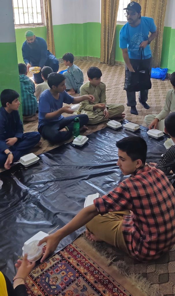 Islamabad, Pakistan - Participating in Orphan Support Program & Mobile Food Rescue Program by Serving Hot Biryani Meals, Desserts, Juices & Candies to 70+ Beloved Orphans at Local Community Orphanage