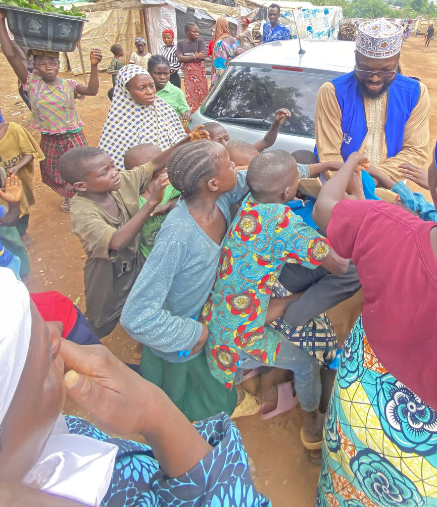 Abuja, Nigeria - Participating in Mobile Food Rescue Program by Serving Hot Meals & Biscuits to 292+ Less Privileged Children & Women