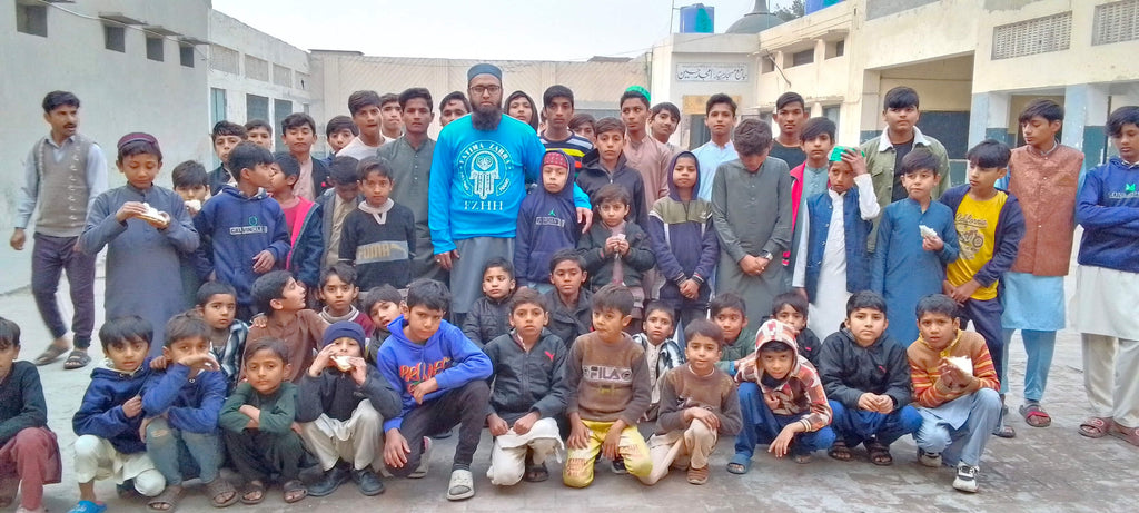 Faisalabad, Pakistan - Participating in Mobile Food Rescue Program by Serving Homemade Sandwiches to 120+ Beloved Orphans & Less Privileged Children