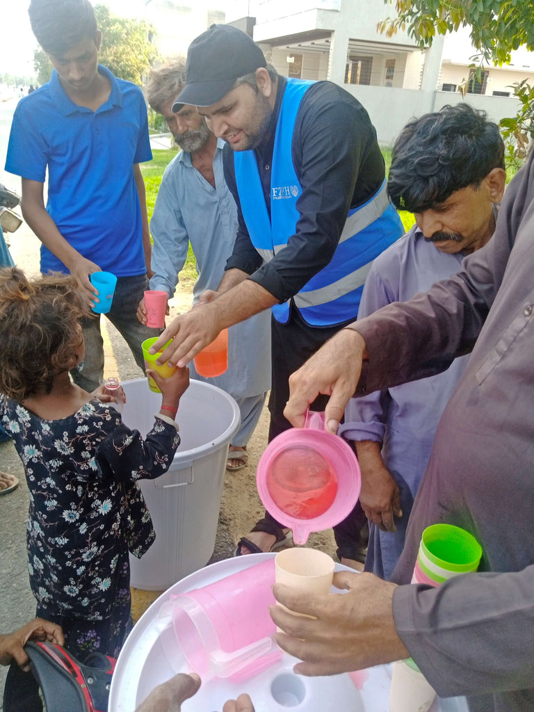 Lahore, Pakistan - Muharram Day 6 - Participating in Our Mobile Food Rescue Program by Serving 60+ Chilled Drinks on Hot Summer Days to Less Privileged People