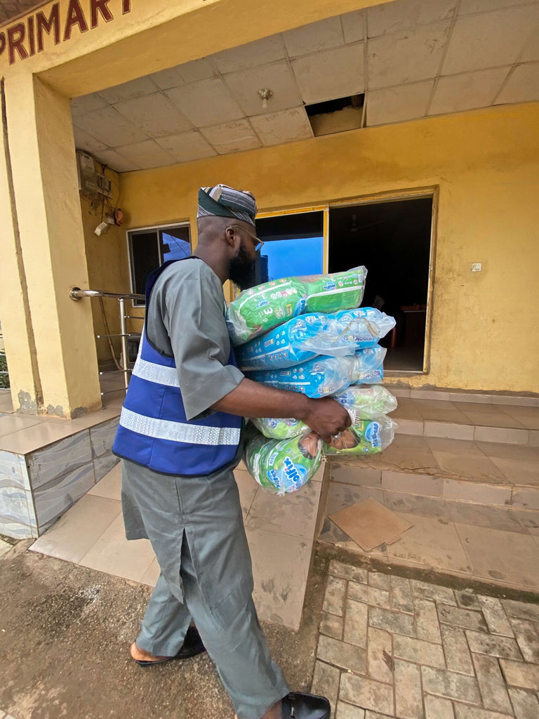 Abuja, Nigeria - Participating in Pediatric Medical Outreach Program by Distributing Essential Pediatric Consumable Supplies & Anti-Malaria and Anti-Typhoid Medications to 150+ Less Privileged Children & Nursing Mothers at Two Local Health Centers