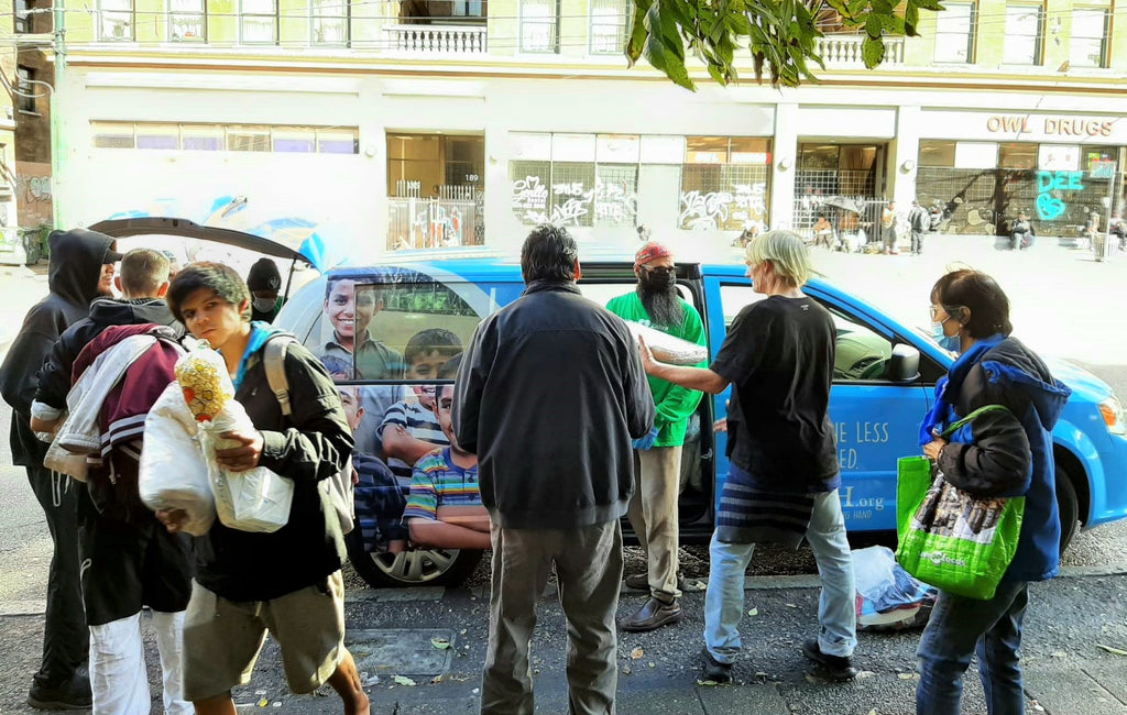 Distribution of Food Bags & Premium Duvets to Our Homeless Community – CAN