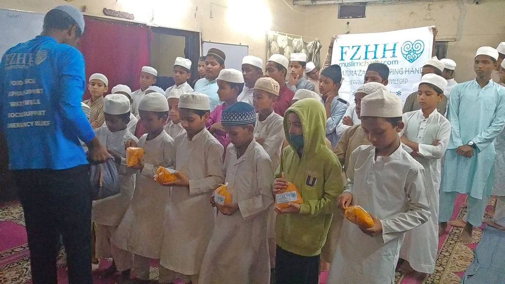 Hyderabad, India - Participating in Our Mobile Food Rescue Program by Preparing, Packaging, Serving & Distributing Hot Homemade Meals to 150+ Less Privileged Madrasa Children & Homeless Families