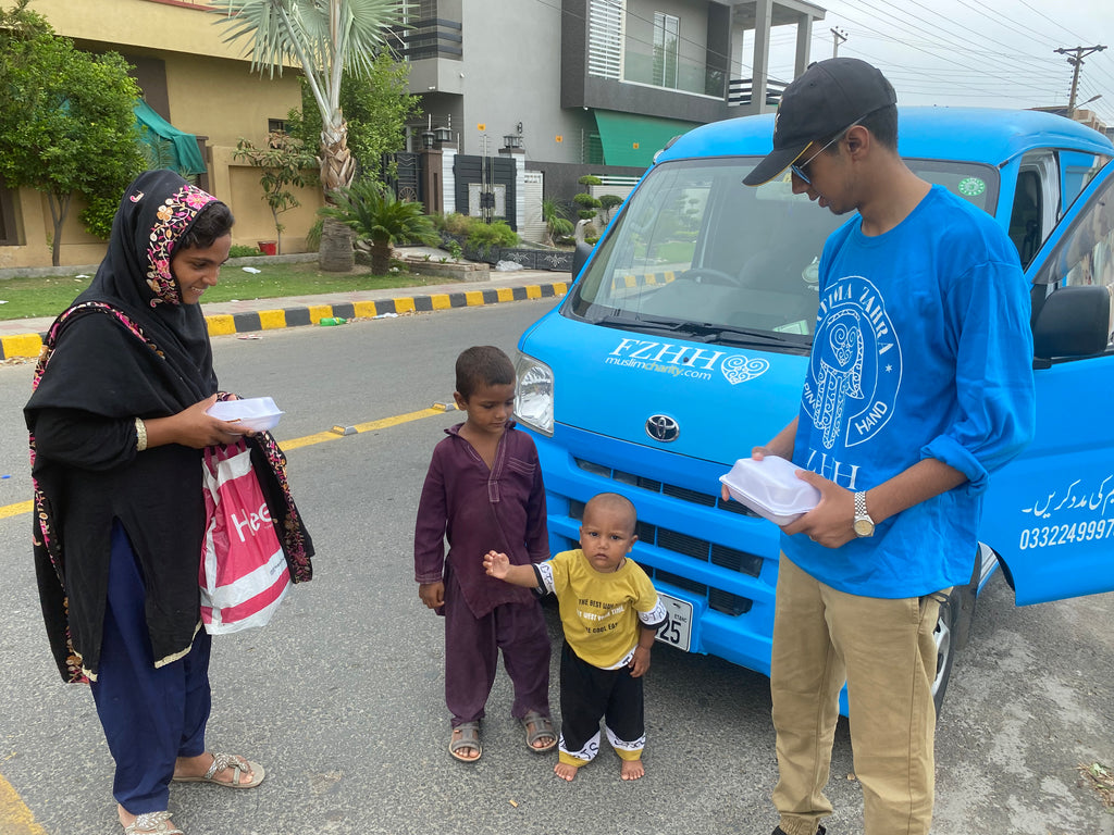 Pakistan - Honoring Welcoming of the Holy Month of Dhul Hijjah & the Holy Marriage of Sayyiditina Fatima az Zahra ع & Sayyidina Imam Ali ع by Distributing 60+ Hot Meals to Community's Homeless People