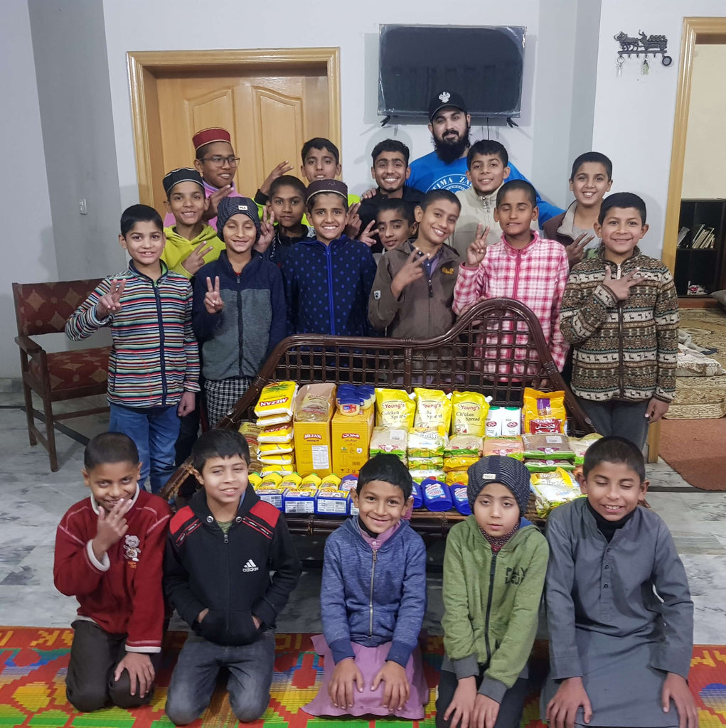 Lahore, Pakistan - Participating in Mobile Food Rescue Program by Distributing Monthly Ration to Local Community's Orphanage
