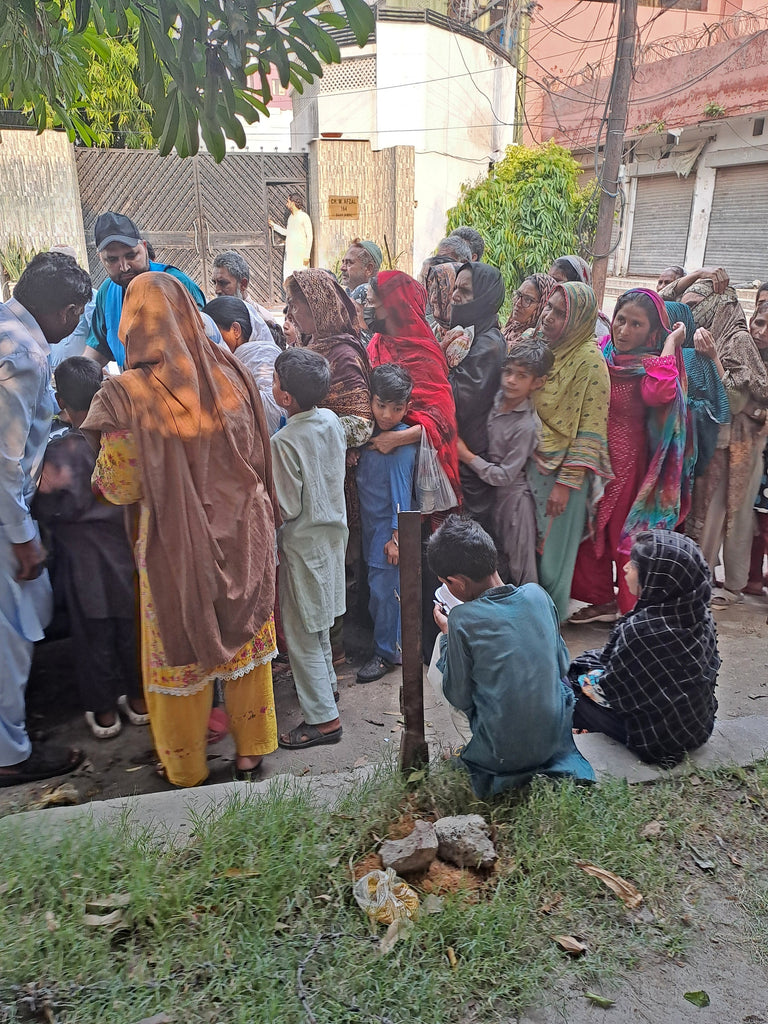 Lahore, Pakistan - Participating in Mobile Food Rescue Program by Distributing Hot Meals to 100+ Less Privileged People at Local Community's Holy Shrine