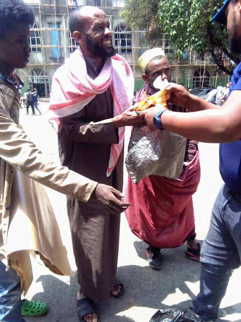 Honoring Wiladat/Holy Birthday of Beloved Shaykh Nurjan Mirahmadi, URS/Union of Mawlana Shaykh Ali ar-Ramitani ق ع & Imam Shamil ع by Distributing 30+ Warm Meals to Less Privileged People at Grand Mosque on Blessed Day of Jummah/Friday - ETH