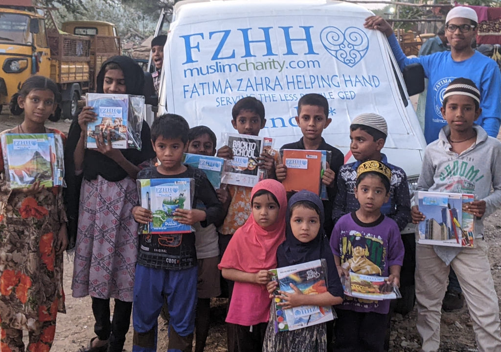 Hyderabad, India - Participating in Mobile Food Rescue Program by Distributing Education Support Kits to Less Privileged Children