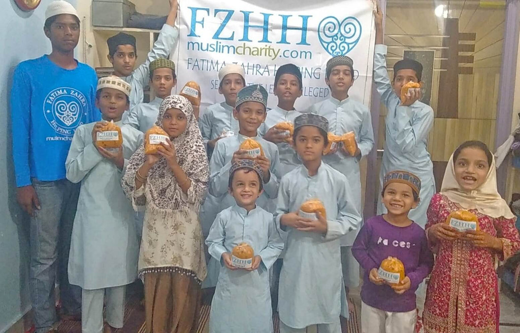 Hyderabad, India - Participating in Our Mobile Food Rescue Program by Preparing, Packaging, Serving & Distributing Hot Homemade Meals to 150+ Less Privileged Madrasa Children & Homeless Families