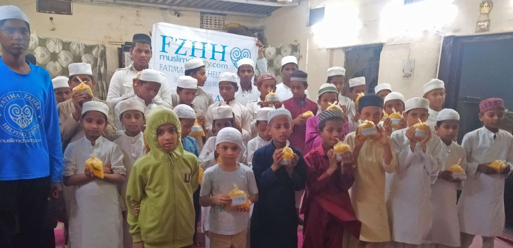 Hyderabad, India - Participating in Our Mobile Food Rescue Program by Preparing, Packaging, Serving & Distributing Hot Homemade Meals to 150+ Less Privileged Madrasa Children & Homeless Families