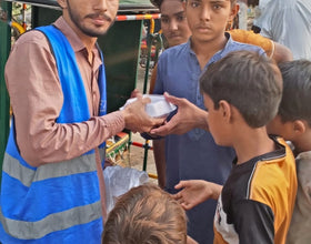 Lahore, Pakistan - Participating in Mobile Food Rescue Program by Distributing Hot Meals (Chicken Biryani) to 50+ Less Privileged Children & Adults