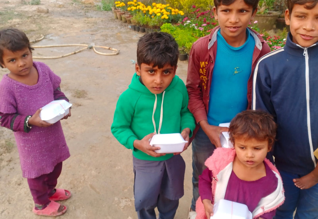 Lahore, Pakistan - Participating in Mobile Food Rescue Program by Distributing Hot Meals (Biryani) to 50+ Less Privileged Children & Adults
