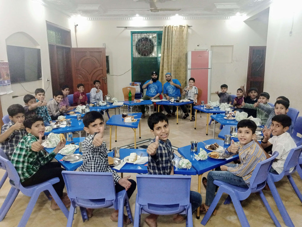Honoring URS Mubarak of Mawlana Jamaluddin al Ghumuqi (Q) & URS Mubarak (Gregorian) of Sultanul Awliya Mawlana Shaykh Nazim Adil al-Haqqani (Q) by Serving Burgers, Fries, Cold Drinks & Blessed Birthday Cakes to Our Beloved Orphans - PK