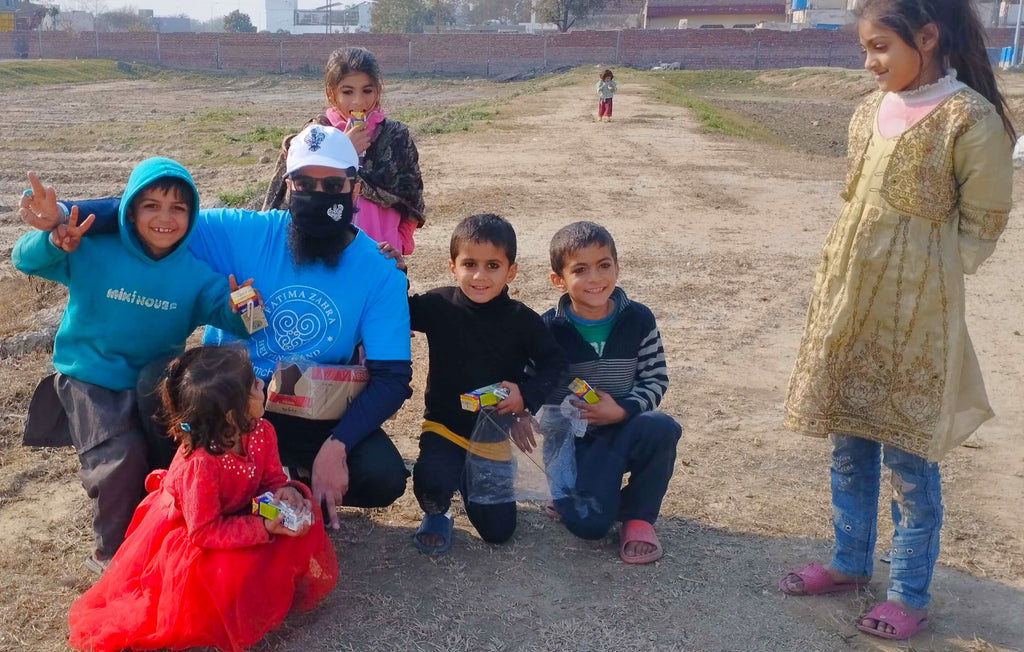 Lahore, Pakistan - Participating in Mobile Food Rescue Program by Distributing Hot Meals & Juices to Local Community's Less Privileged Children & Families in Need