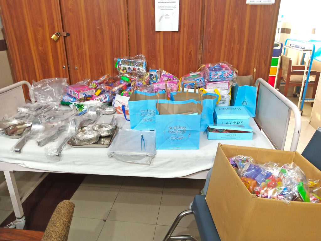 Lahore, Pakistan - Participating in Mobile Food Rescue Program by Distributing Essential Pediatric Medical Equipment & Goodie Bags Filled with Snacks & Candies at Local Community's Hospital Serving Less Privileged Children
