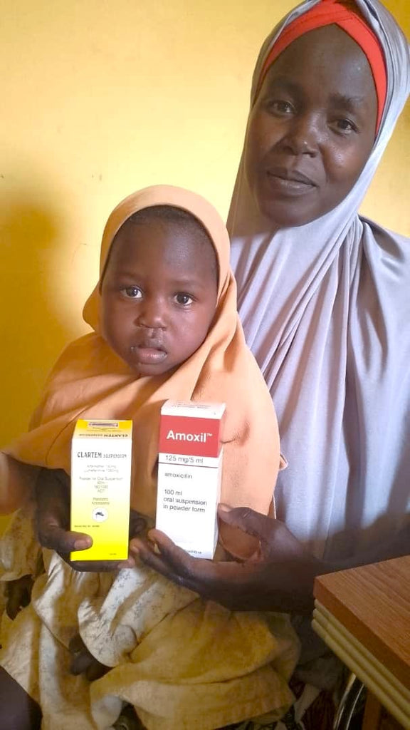 Abuja, Nigeria - Participating in Pediatric Medical Outreach Program & Mobile Food Rescue Program by Distributing Anti-Malaria & Anit-Typhoid Medications and Administration Supplies to 100s of Babies & Children at Local Health Center