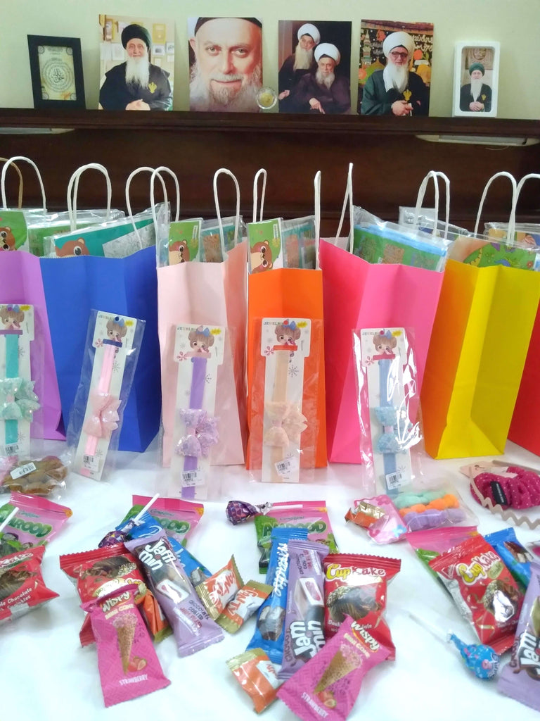 Karachi, Pakistan - Participating in Our Orphan Support Program by Serving Hot Lunch Boxes & Distributing Goodie Bags Filled with Snacks, Candies, Toys & Accessories to 60+ Beloved Orphans & Less Privileged Girls with Disabilities