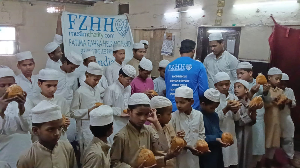 Hyderabad, India - Participating in Our Mobile Food Rescue Program by Preparing, Packaging, Serving & Distributing Hot Homemade Meals to 150+ Less Privileged Madrasa Children & Homeless Families