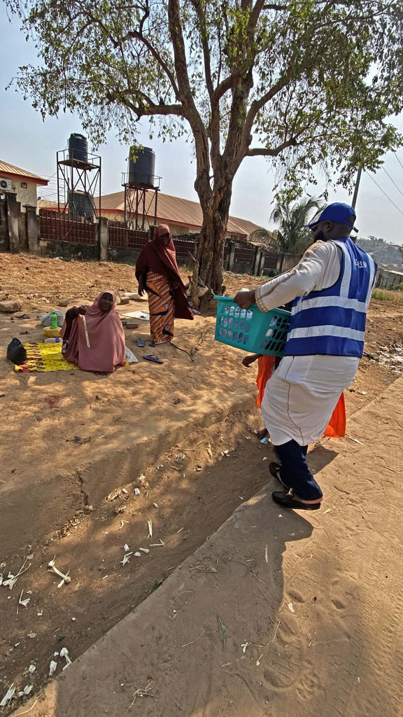 Abuja, Nigeria - Participating in our Mobile Food Rescue Program by Preparing, Packaging & Distributing Hot Homemade Meals & Water Bottles to 30+ Less Privileged People