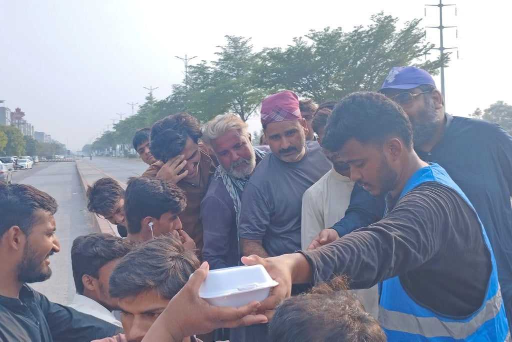 Lahore, Pakistan - Participating in Our Mobile Food Rescue Program by Distributing 50+ Hot Lunch Boxes & Serving 100+ Chilled Drinks on Hot Summer Days to Less Privileged People