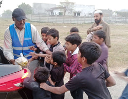 Lahore, Pakistan - Participating in Mobile Food Rescue Program by Distributing Hot Meals (Haleem with Naan) to 150+ Less Privileged Children & Adults