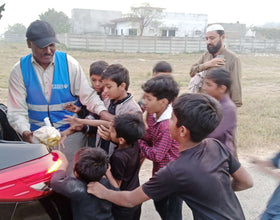 Lahore, Pakistan - Participating in Mobile Food Rescue Program by Distributing Hot Meals (Haleem with Naan) to 150+ Less Privileged Children & Adults