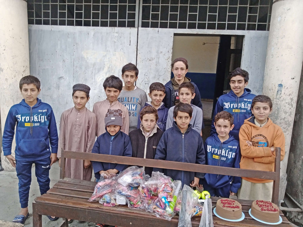 Lahore, Pakistan - Participating in Orphan Support Program by Distributing Brand New Sporting Equipment & Goodie Bags Filled with Gifts and Serving Blessed Birthday Cakes to Beloved Orphans at Local Community's Orphanage