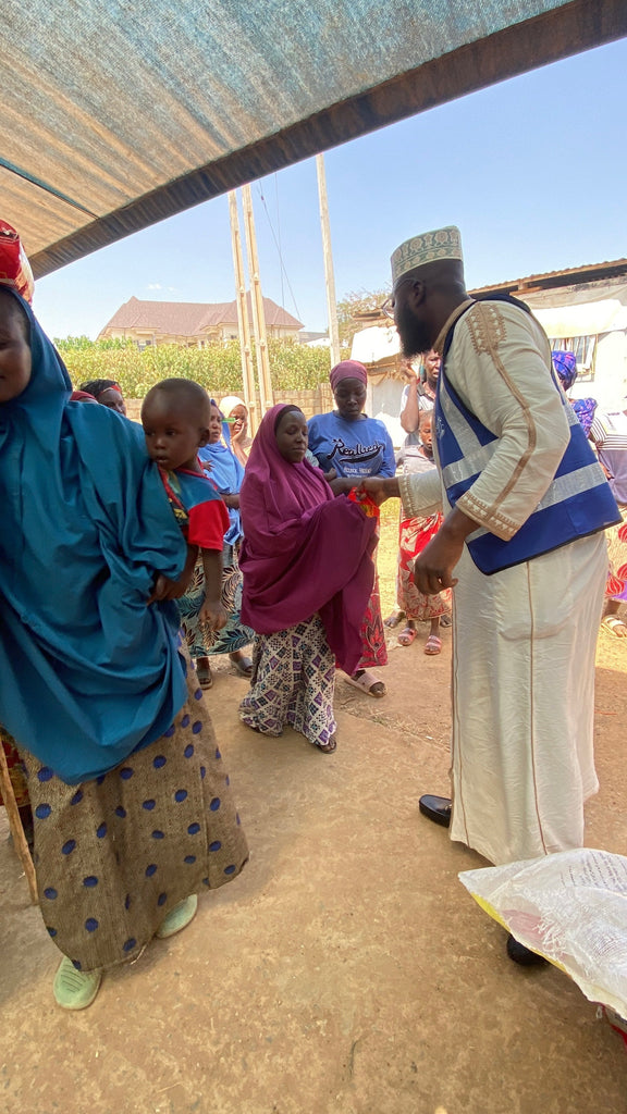 Abuja, Nigeria - Participating in Mobile Food Rescue Program by Distributing 13+ Rice Bags to Disabled Families & Lots of Candies to Less Privileged Children at Local Community's Internally Displaced Camp