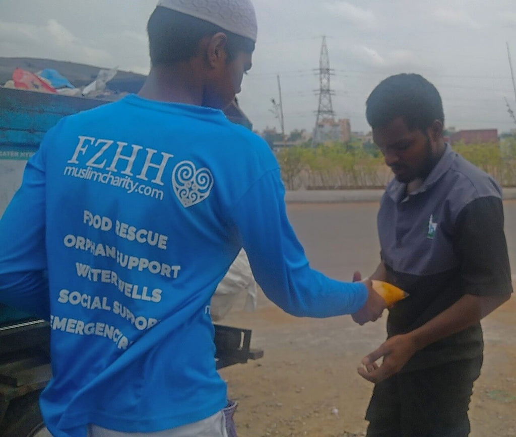 Hyderabad, India - Participating in Our Mobile Food Rescue Program by Preparing, Packaging & Distributing Hot Homemade Meals to 150+ Less Privileged People