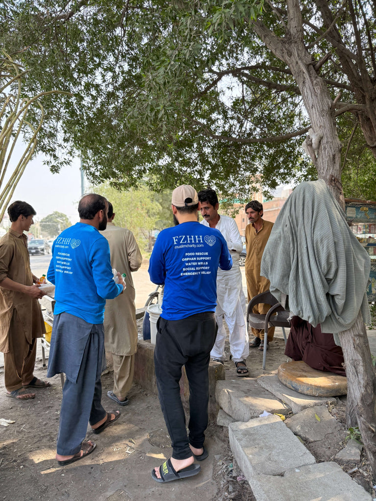 Karachi, Pakistan - Participating in Our Mobile Food Rescue Program by Preparing, Packaging, Serving & Distributing Hot Meals & Cold Drinks to 300+ Less Privileged Children, Women & Men