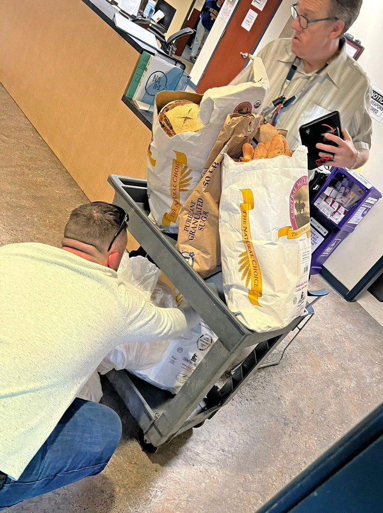 Oakland, California - Participating in Our Weekly Mobile Food Rescue Program by Rescuing & Distributing 600+ lbs. of Fresh Breads & Bakery Items to Local Community's Detox & Rehab Center