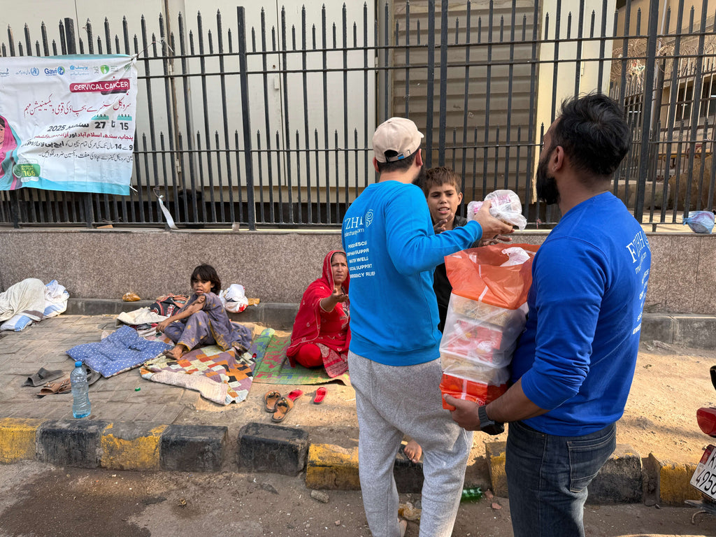 Karachi, Pakistan - Participating in Our Mobile Food Rescue Program by Preparing, Packaging, Serving & Distributing Hot Meals & Cold Drinks to 150+ Less Privileged Children, Women & Men