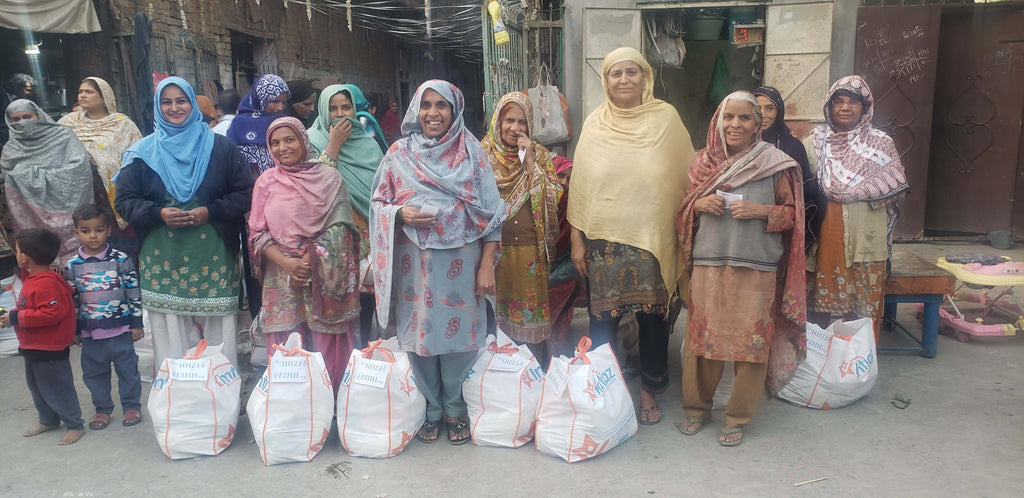 Lahore, Pakistan - Participating in Mobile Food Rescue Program by Distributing Monthly Ration to Local Community's Less Privileged Families